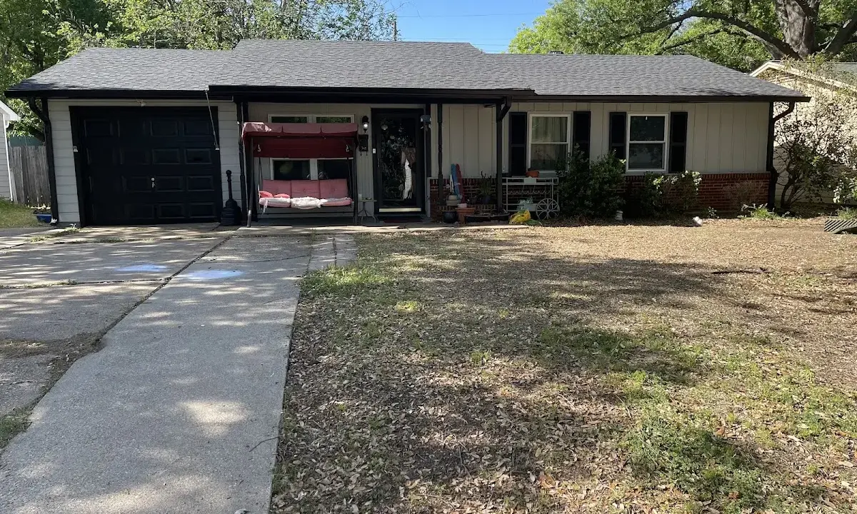 Soffit & Fascia Repair crew at work on a residential roof in Lufkin